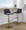 Toriano Contemporary Adjustable Barstool with Swivel in Blue Fabric and Gold Metal with Rounded T Footrest- Set of 2 — lifestyle photo 2
