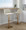 Tintori table in Cream Noise Fabric, Gold Metal, featuring swivel and adjustable height