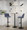Toriano Contemporary Adjustable Barstool with Swivel in Blue Fabric and Black Metal with Rounded T Footrest- Set of 2 — lifestyle photo 1