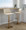 Tintori table in Cream PU, Gold Metal, featuring swivel and adjustable height