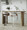 Vintage Mod Mid-Century Modern Adjustable Barstool with Swivel in Chrome Metal, Walnut Wood and Light Grey Fabric with Rounded T Footrest — lifestyle photo 3