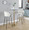 Pebble Contemporary/Glam Adjustable Dining To Bar Table in Gold Metal and Black Wood — lifestyle photo 2