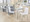 Mason Contemporary Upholstered Chair in Brushed Stainless Steel and White Faux Leather- Set of 2 — lifestyle photo 6
