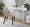 Rina dining chair in Black Wood, Light Brown Fabric, featuring upholstered seat