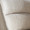 Rina dining chair in Black Wood, Light Brown Fabric, close-up detail, featuring upholstered seat