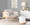 Kari accent chair in White Metal, Natural Wood, Cream Fabric, featuring upholstered seat