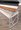 Constellation Contemporary Bench in Silver Metal and White Faux Leather — lifestyle photo 4