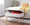 Storage Contemporary Bench in Natural Wood and Beige Fabric — lifestyle photo 3