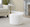 Daisy Contemporary Ottoman in White Fabric — lifestyle photo 2