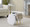 Diamond Contemporary Ottoman in Gold Metal and Light Grey Fabric with Storage — lifestyle photo 2