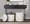 Maverick Contemporary Nesting Ottoman Set in Cream Faux Leather with Textured Accent — lifestyle photo 3