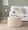 Braided Round 24" Ottoman in Cream Velvet — lifestyle photo 2