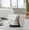 Tahoe Eclectic 18" Band Storage Ottoman in Black Metal and Cream Handwoven Wool — lifestyle photo 2