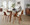 Folia dining table in Walnut Wood, Clear Glass, close-up detail