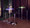 Spyra table in Chrome Metal, Clear Acrylic, Black Pvc, lifestyle room setting, featuring adjustable height