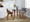 Folia table set in Walnut Wood, Clear Glass, Grey Fabric, featuring glass design and fabric design
