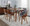 Folia table set in Walnut Wood, Grey Fabric, featuring fabric design