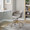 Curvo Upholstered Contemporary Task Chair in Gold Metal and Light Grey Faux Leather — lifestyle photo 1