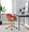 Margarite Contemporary Task Chair in Gold Metal and Orange Fabric — lifestyle photo 1
