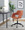 Margarite Contemporary Task Chair in Black Metal and Orange Fabric — lifestyle photo 1
