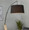 Robyn Mid-Century Modern Floor Lamp in Natural Wood and Black Metal with Black Linen Shade — lifestyle photo 5