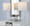 Bishop 24" Contemporary Glass Table Lamp in Clear Seeded Glass, Brushed Nickel and White Linen Shade From Grandview Gallery- Set of 2 — lifestyle photo 1