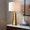 Pompeii 29" Contemporary Polyresin Table Lamp in Gold Polyresin and White Linen — lifestyle photo 1