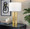 Cosmo 28" Glam Table Lamp in Antique Brass and White Linen From Grandview — lifestyle photo 1
