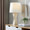 Curvo 27" Glam Ceramic Square Table Lamp in Cream Ceramic and White Shade — lifestyle photo 1