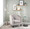 Trombone table in Black Marble, Nickel, Clear Glass, featuring glass top