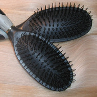 Loop Brush designed for hair extensions for easy brushing.