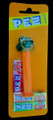 Green Crystal Alligator  with Neon Orange stem on 2002 Orange Asian Card