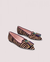 Loafer Ella with a pointed toe in light brown suede with black velvet zebra print featuring multicoloured tassel detail, rubber sole, leather insole and textile lining.
Suede
