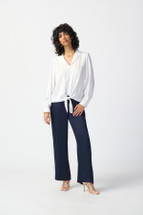 100% Polyester
No pockets
No zipper
Our model is 5'9"/175 cm and wears a size 6.
Approximate length (size 12): 27" - 69 cm