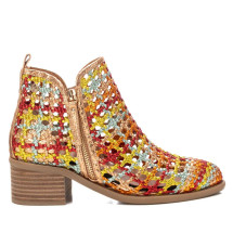 Women's ankle boots from Xti. Made of textile material with metallic effect. Braided design in different colours, to give a colourful touch to your summer looks. Lined wood-effect heel and non-slip sole.
