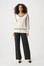 70% Wool, 30% Cashmere
No pockets
No zipper
Unlined
Our model is 5'9"/175 cm and wears a size 6 / S
Approximate length (size 12): 27" - 69 cm