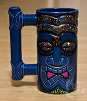 One of a kind green ceramic Tiki Mug 100% made in Hawaii hand painted by Shannon O'Connell. Features a special glow in the dark blacklight paint and is selected directly from Shannon's private collection.