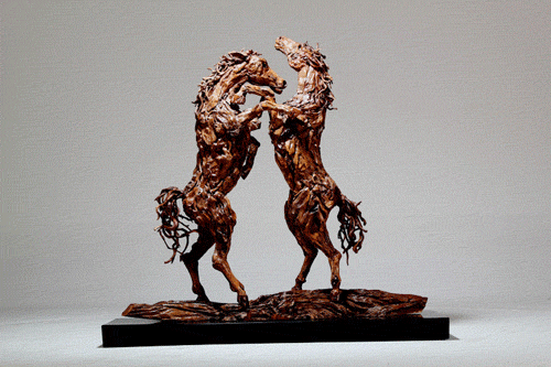 driftwood-fighting-stallions-01.gif
