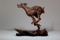      On the Run a Lifesized Driftwood Dog Sculpture by James Doran Webb