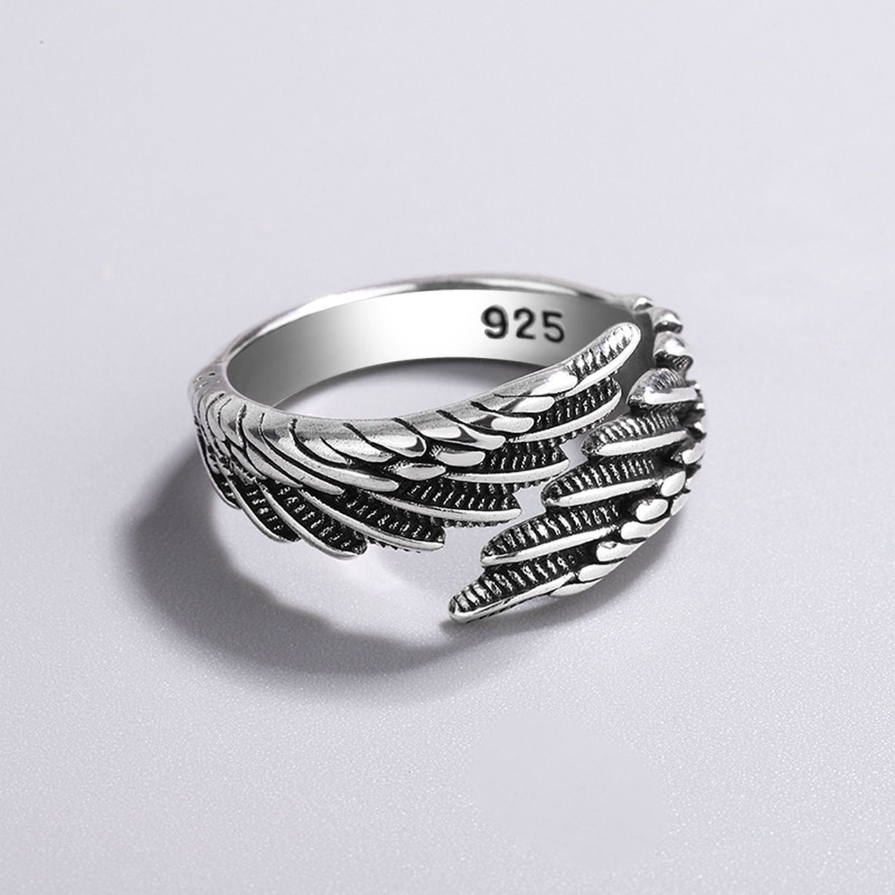 Silver feather store thumb ring