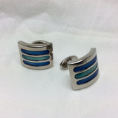 Two tones of blue cat's eye set in curved regtangular solid bar cufflinks