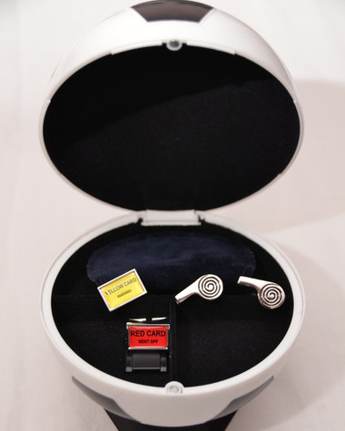 Two Pairs of Football / Referree Cufflinks and a football shaped stoage case