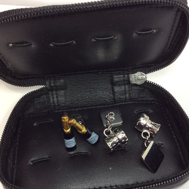 Fabulous gift set comprising two pairs of Champagne theme cufflinks in a leather storage case