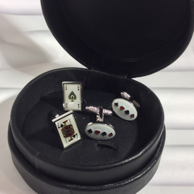 Pair of Blackjack (Ace of Spades and Jack of Spades) T-Bar cufflinks and a Pair of Oval four suits cufflinks in a wonderful circular soft padded real leather black storage case, at a special gift set price.