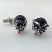 Vampire style cufflinks, with white eyeballs and blood red fangs!