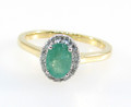 9ct Gold 7x4mm Oval Shaped Emerald And Diamond Cluster Ring