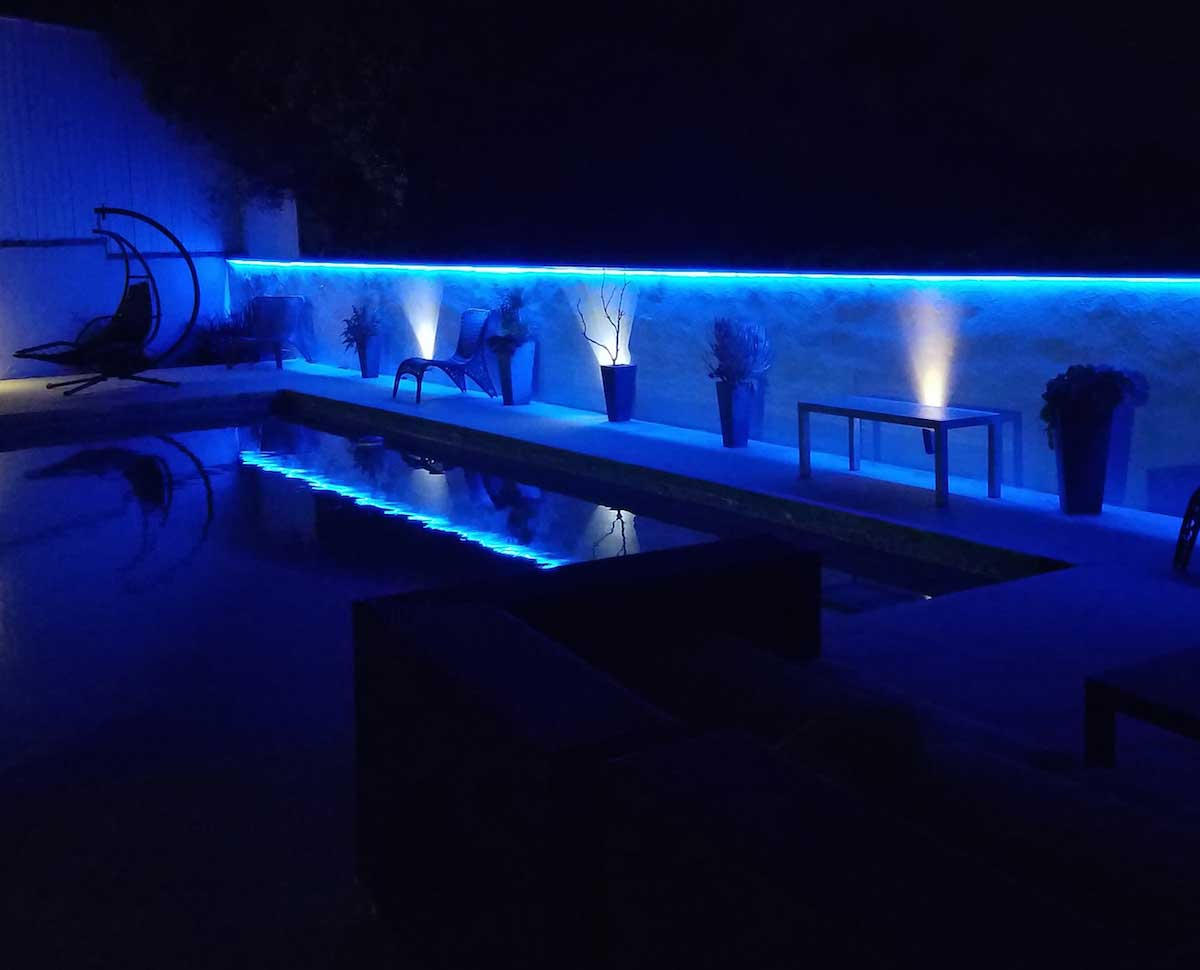 blue outdoor poolside accent lighting   