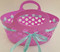 oval plastic basket with ribbons