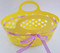 oval plastic basket with ribbons