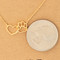 dog paw heart cutout pendant necklace gold